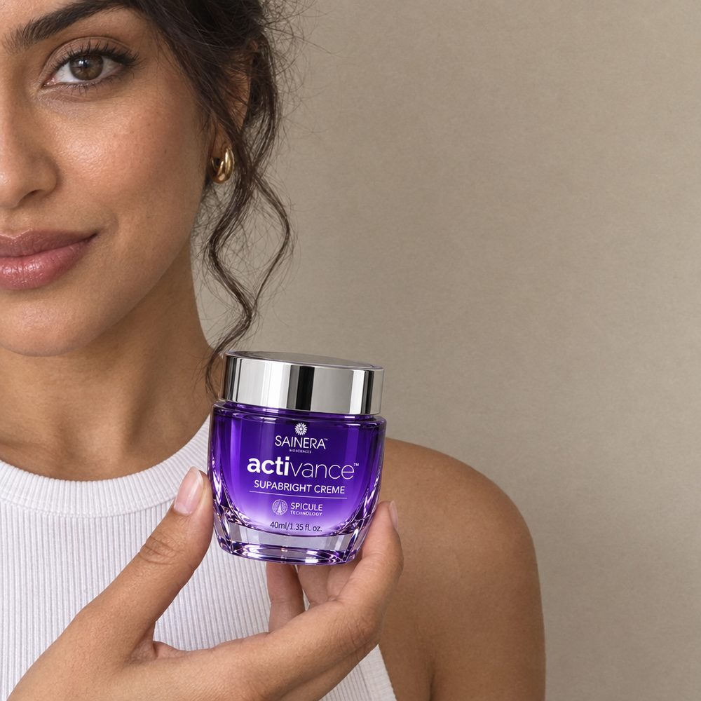 Woman holding Activance Supabright Cream